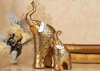Estatua animal de la estatuilla del elefante del color oro de los artes de las decoraciones del hogar de la resina